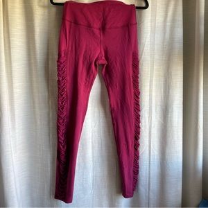 Magenta leggings with ruching on sides